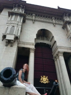 Anna at the entrance of a building