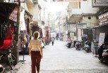 Anna is strolling in Rishikesh, India
